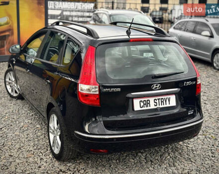 Черный Хендай i30, объемом двигателя 1.6 л и пробегом 187 тыс. км за 6900 $, фото 22 на Automoto.ua