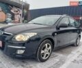 Чорний Хендай i30, об'ємом двигуна 1.4 л та пробігом 226 тис. км за 4999 $, фото 1 на Automoto.ua