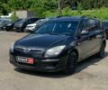 Черный Хендай i30, объемом двигателя 1.4 л и пробегом 228 тыс. км за 5490 $, фото 1 на Automoto.ua