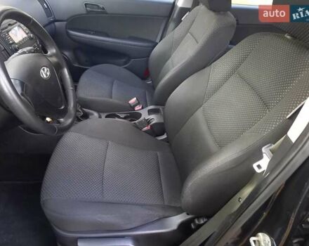 Хендай i30 2009 у Черкасах на Automoto.ua Чорний Хендай i30, об'ємом двигуна 1.4 л та пробігом 188 тис. км за 6150 $, фото 23 на Automoto.ua