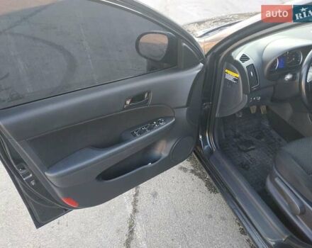 Черный Хендай i30, объемом двигателя 1.4 л и пробегом 158 тыс. км за 5600 $, фото 12 на Automoto.ua