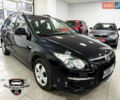 Черный Хендай i30, объемом двигателя 1.4 л и пробегом 190 тыс. км за 6900 $, фото 1 на Automoto.ua