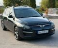 Черный Хендай i30, объемом двигателя 1.59 л и пробегом 251 тыс. км за 6000 $, фото 1 на Automoto.ua