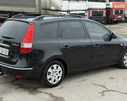 Черный Хендай i30, объемом двигателя 1.6 л и пробегом 265 тыс. км за 5900 $, фото 6 на Automoto.ua