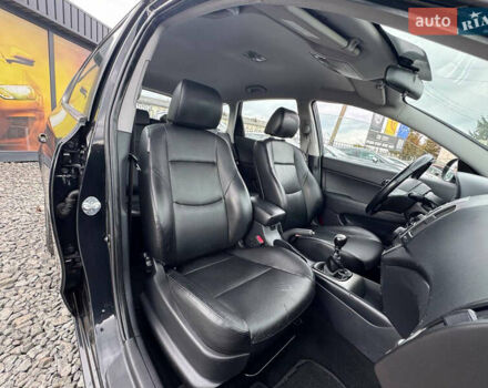 Черный Хендай i30, объемом двигателя 1.6 л и пробегом 187 тыс. км за 6900 $, фото 26 на Automoto.ua