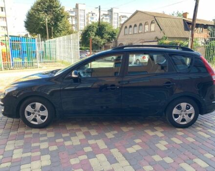 Черный Хендай i30, объемом двигателя 1.6 л и пробегом 189 тыс. км за 6950 $, фото 1 на Automoto.ua
