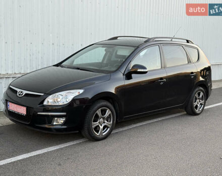 Чорний Хендай i30, об'ємом двигуна 1.6 л та пробігом 198 тис. км за 6400 $, фото 1 на Automoto.ua
