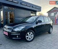 Черный Хендай i30, объемом двигателя 1.6 л и пробегом 230 тыс. км за 5888 $, фото 1 на Automoto.ua