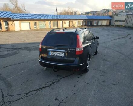 Черный Хендай i30, объемом двигателя 1.4 л и пробегом 158 тыс. км за 5600 $, фото 6 на Automoto.ua