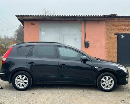 Черный Хендай i30, объемом двигателя 1.6 л и пробегом 265 тыс. км за 6200 $, фото 5 на Automoto.ua
