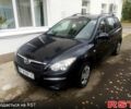 Черный Хендай i30, объемом двигателя 1.4 л и пробегом 200 тыс. км за 5400 $, фото 3 на Automoto.ua