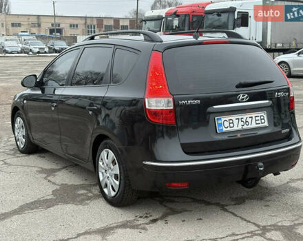 Черный Хендай i30, объемом двигателя 1.6 л и пробегом 265 тыс. км за 5900 $, фото 3 на Automoto.ua