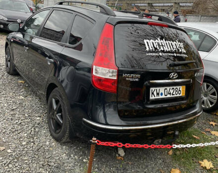 Черный Хендай i30, объемом двигателя 1.4 л и пробегом 228 тыс. км за 5800 $, фото 2 на Automoto.ua