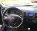 Хендай i30 2009 у Черкасах на Automoto.ua Чорний Хендай i30, об'ємом двигуна 1.4 л та пробігом 188 тис. км за 6150 $, фото 27 на Automoto.ua