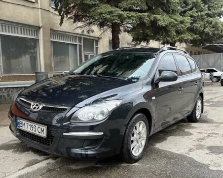 Черный Хендай i30, объемом двигателя 1.4 л и пробегом 174 тыс. км за 6000 $, фото 6 на Automoto.ua