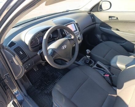 Черный Хендай i30, объемом двигателя 1.4 л и пробегом 237 тыс. км за 5600 $, фото 3 на Automoto.ua