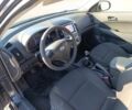 Черный Хендай i30, объемом двигателя 1.4 л и пробегом 237 тыс. км за 5600 $, фото 3 на Automoto.ua