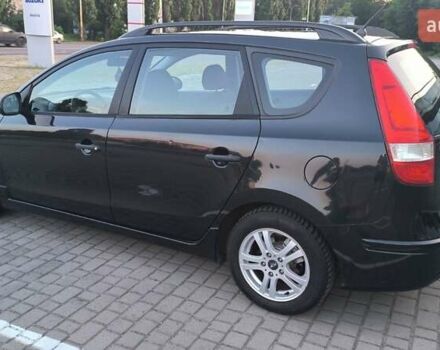 Черный Хендай i30, объемом двигателя 1.59 л и пробегом 245 тыс. км за 6990 $, фото 6 на Automoto.ua