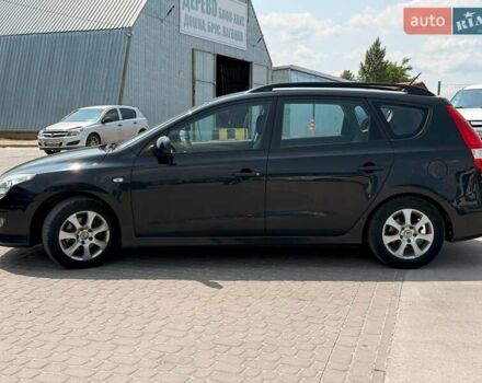 Черный Хендай i30, объемом двигателя 1.4 л и пробегом 223 тыс. км за 5300 $, фото 5 на Automoto.ua