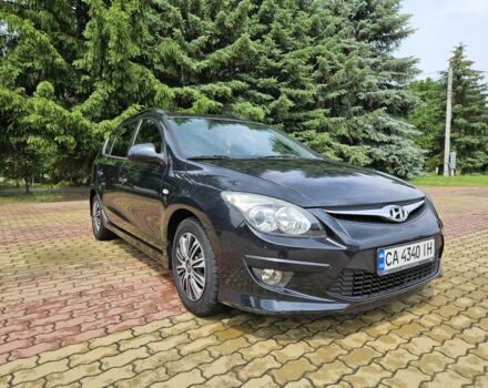 Черный Хендай i30, объемом двигателя 1.4 л и пробегом 157 тыс. км за 6700 $, фото 2 на Automoto.ua