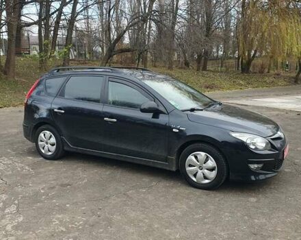 Чорний Хендай i30, об'ємом двигуна 1.4 л та пробігом 149 тис. км за 6100 $, фото 1 на Automoto.ua