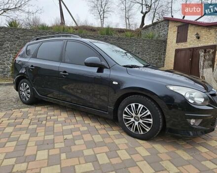 Черный Хендай i30, объемом двигателя 1.4 л и пробегом 154 тыс. км за 6700 $, фото 4 на Automoto.ua