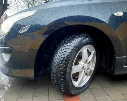 Черный Хендай i30, объемом двигателя 1.6 л и пробегом 219 тыс. км за 6300 $, фото 3 на Automoto.ua