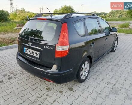 Чорний Хендай i30, об'ємом двигуна 1.4 л та пробігом 225 тис. км за 4800 $, фото 4 на Automoto.ua