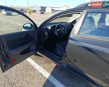 Черный Хендай i30, объемом двигателя 1.4 л и пробегом 237 тыс. км за 5600 $, фото 4 на Automoto.ua