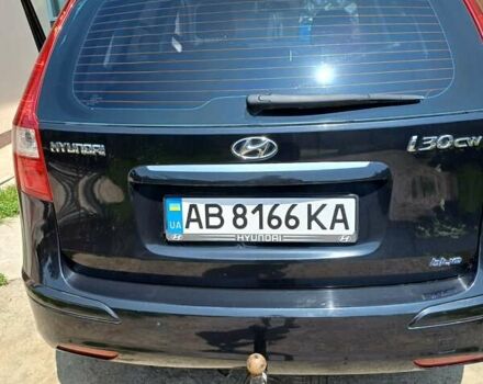 Черный Хендай i30, объемом двигателя 1.58 л и пробегом 330 тыс. км за 6100 $, фото 1 на Automoto.ua