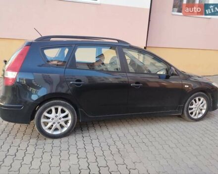 Черный Хендай i30, объемом двигателя 1.58 л и пробегом 190 тыс. км за 7100 $, фото 4 на Automoto.ua