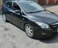 Чорний Хендай i30, об'ємом двигуна 1.4 л та пробігом 176 тис. км за 5700 $, фото 6 на Automoto.ua