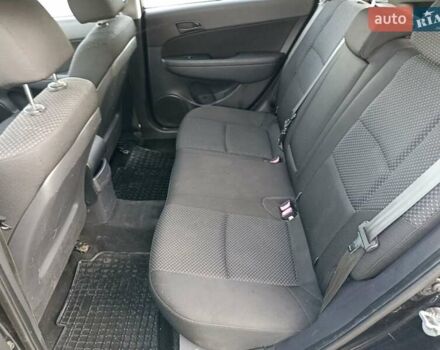 Чорний Хендай i30, об'ємом двигуна 1.4 л та пробігом 225 тис. км за 4800 $, фото 13 на Automoto.ua