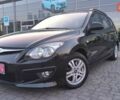 Черный Хендай i30, объемом двигателя 1.59 л и пробегом 245 тыс. км за 6990 $, фото 1 на Automoto.ua