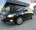 Черный Хендай i30, объемом двигателя 1.4 л и пробегом 162 тыс. км за 6450 $, фото 1 на Automoto.ua