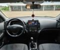Черный Хендай i30, объемом двигателя 1.4 л и пробегом 157 тыс. км за 6700 $, фото 9 на Automoto.ua