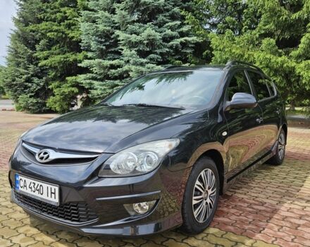 Черный Хендай i30, объемом двигателя 1.4 л и пробегом 157 тыс. км за 6700 $, фото 1 на Automoto.ua