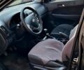 Черный Хендай i30, объемом двигателя 1.6 л и пробегом 212 тыс. км за 5800 $, фото 2 на Automoto.ua