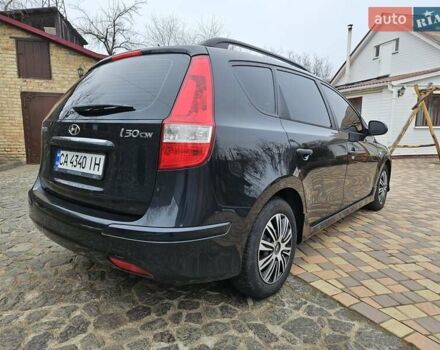 Черный Хендай i30, объемом двигателя 1.4 л и пробегом 154 тыс. км за 6700 $, фото 8 на Automoto.ua