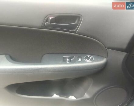 Черный Хендай i30, объемом двигателя 1.58 л и пробегом 190 тыс. км за 7100 $, фото 11 на Automoto.ua