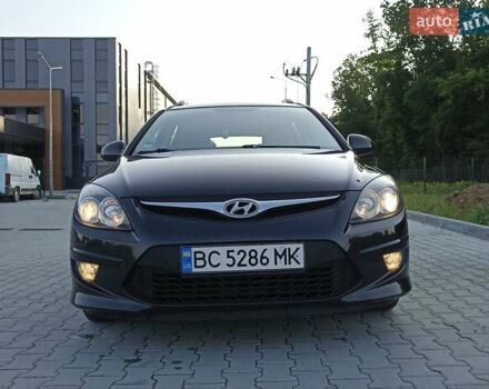 Чорний Хендай i30, об'ємом двигуна 1.4 л та пробігом 225 тис. км за 4800 $, фото 2 на Automoto.ua