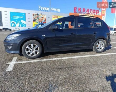 Черный Хендай i30, объемом двигателя 1.4 л и пробегом 237 тыс. км за 5600 $, фото 3 на Automoto.ua