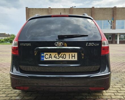 Черный Хендай i30, объемом двигателя 1.4 л и пробегом 157 тыс. км за 6700 $, фото 5 на Automoto.ua