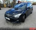 Черный Хендай i30, объемом двигателя 1.6 л и пробегом 290 тыс. км за 5900 $, фото 1 на Automoto.ua
