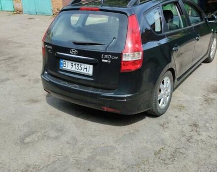 Чорний Хендай i30, об'ємом двигуна 1.4 л та пробігом 176 тис. км за 5700 $, фото 5 на Automoto.ua