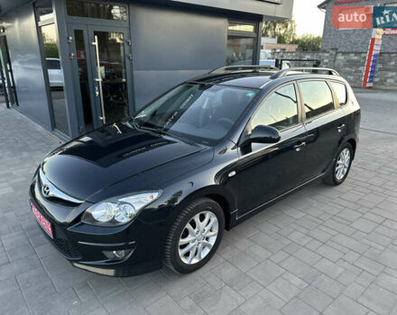 Черный Хендай i30, объемом двигателя 1.4 л и пробегом 162 тыс. км за 6450 $, фото 4 на Automoto.ua