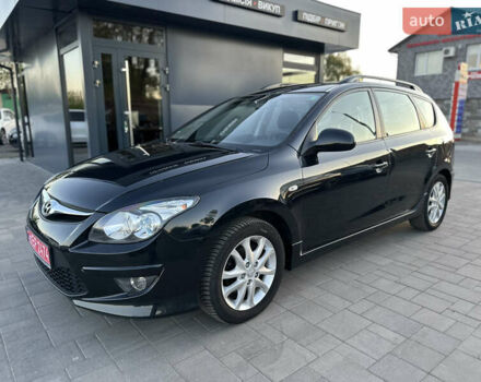 Черный Хендай i30, объемом двигателя 1.4 л и пробегом 162 тыс. км за 6450 $, фото 3 на Automoto.ua