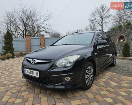 Черный Хендай i30, объемом двигателя 1.4 л и пробегом 154 тыс. км за 6700 $, фото 2 на Automoto.ua