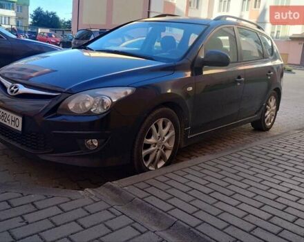 Черный Хендай i30, объемом двигателя 1.58 л и пробегом 190 тыс. км за 7100 $, фото 7 на Automoto.ua