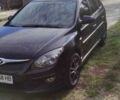 Черный Хендай i30, объемом двигателя 1.6 л и пробегом 252 тыс. км за 5900 $, фото 1 на Automoto.ua